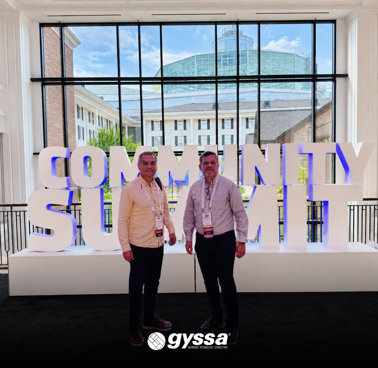 Equipo de GYSSA frente al letrero de Community Summit North America 2026 en Nashville